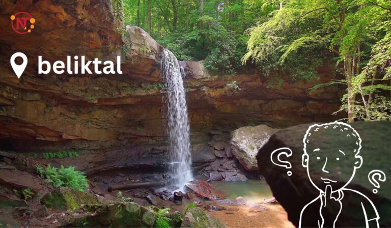 Waterfall cascading over a rocky cliff surrounded by lush green forest in Beliktal, with a cartoon character thinking and question marks illustrating curiosity about the location. - NEWS TAKER